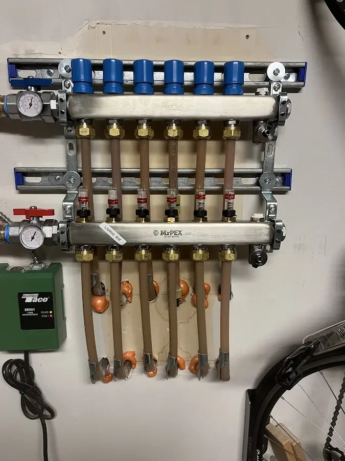 Plumber performing Water Heater Repair at a residential property in Moberly